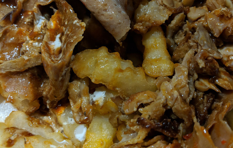 Dig beneath the meat and sauce to find a pillow made of hot chips.